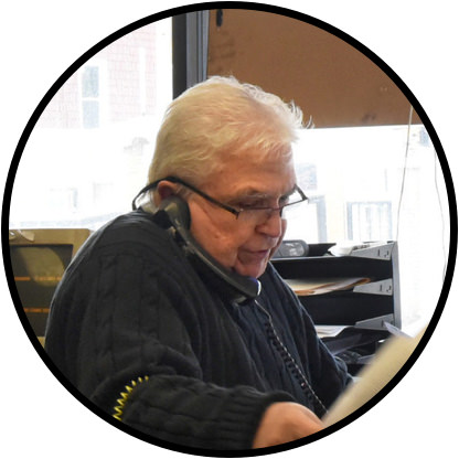 A Virtual Assist user speaking on a telephone